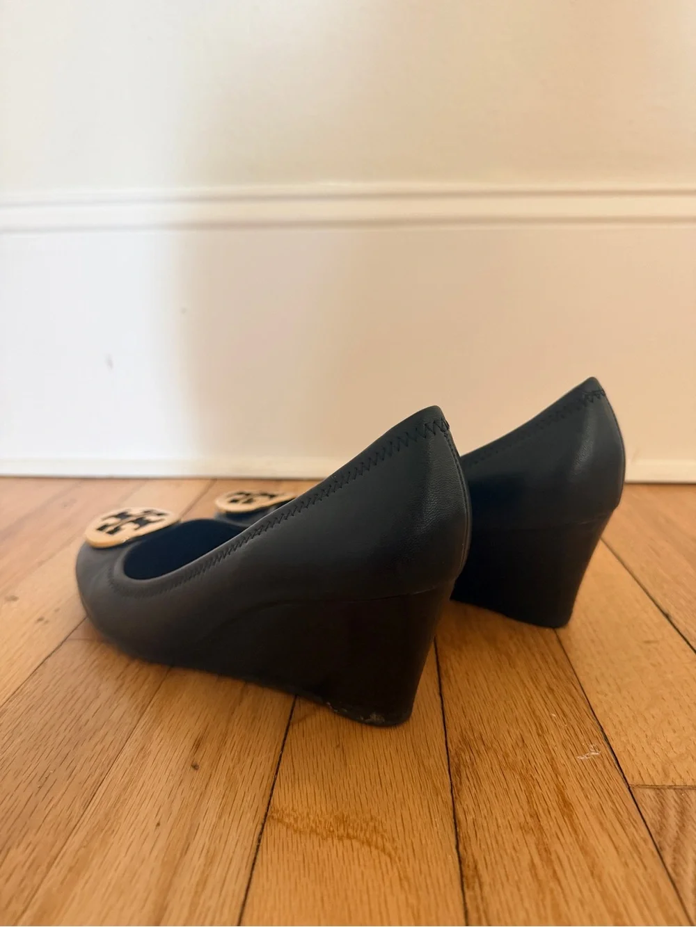 Tory Burch Black Leather Wedges with Gold Logo Medallions